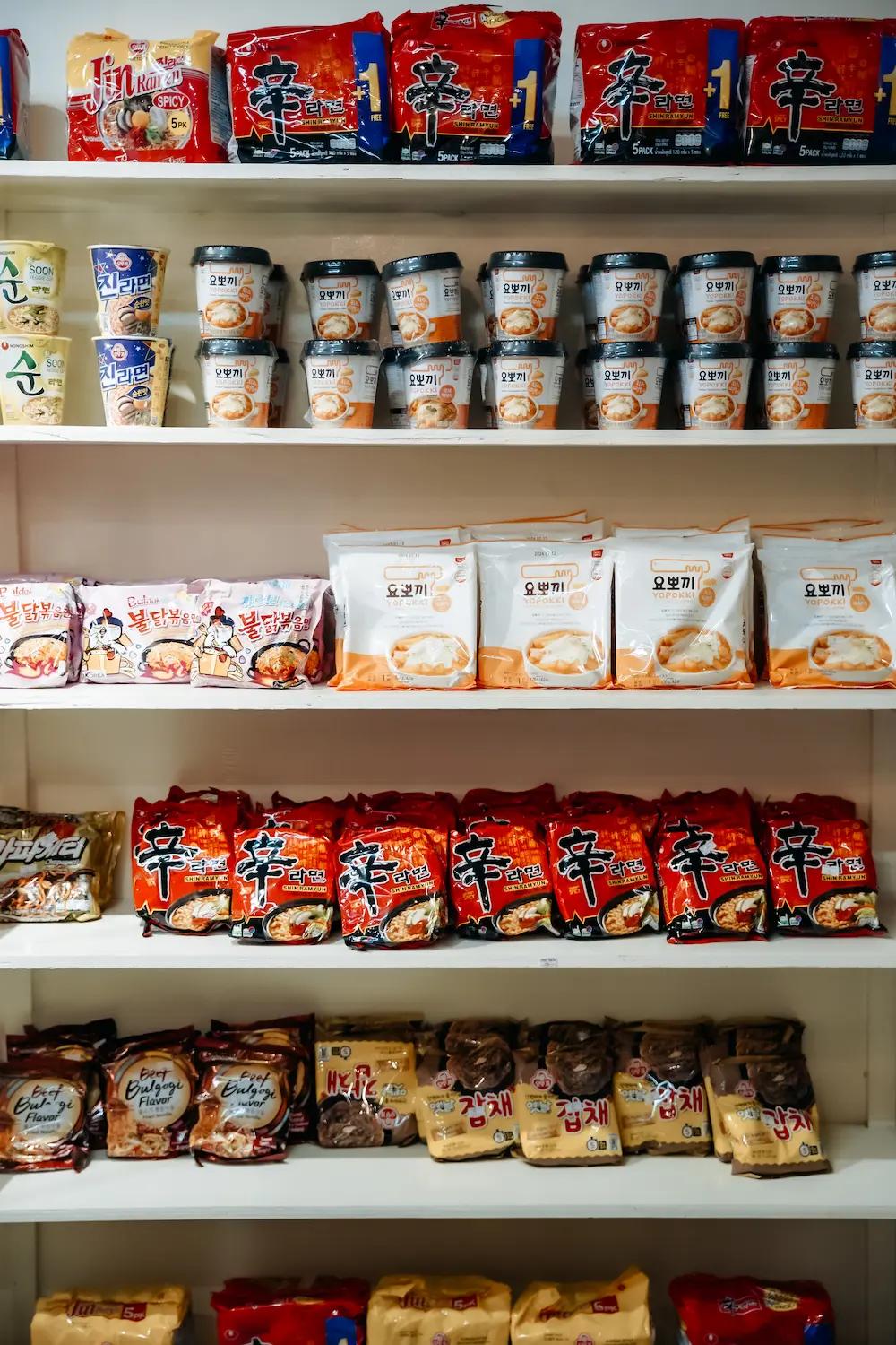 A shelf containing assorted noodles and soups of Korea